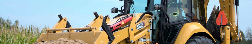 CATERPILLAR ÁROKÁSÓ-RAKODÓ